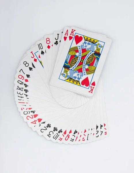 Jugar a las cartas sobre un fondo blanco —  Fotos de Stock