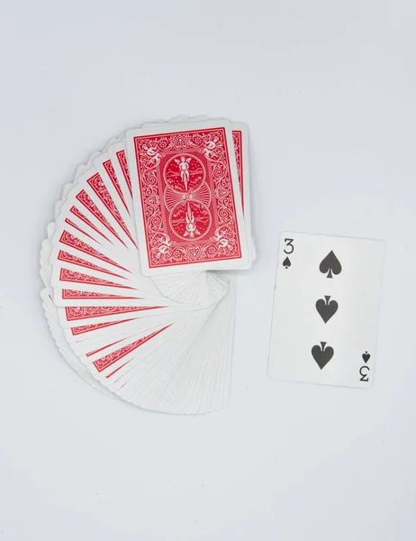 Jouer aux cartes sur un fond blanc — Photo