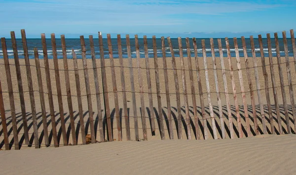 Fence on a beach