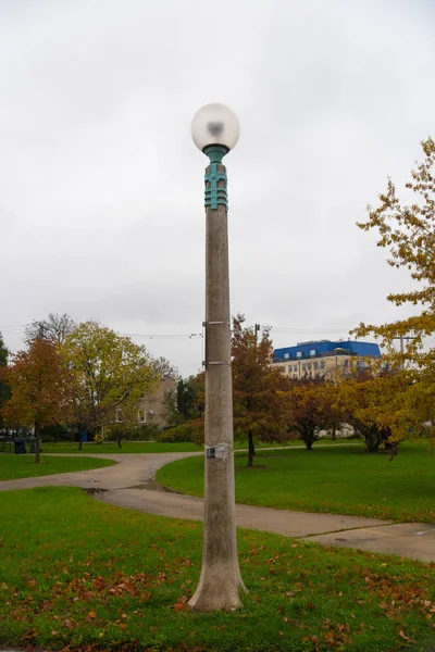 Big lamp in the park on a cloudy day