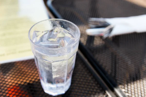 Glass Of Water With Ice In Restaurant Dark Room Selective Focus Refreshment Drink Stock Photo