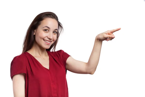 Casual jonge vrouw wijzend — Stockfoto