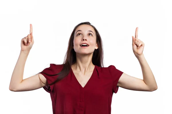 Attractive young woman pointing up — Stock Photo, Image