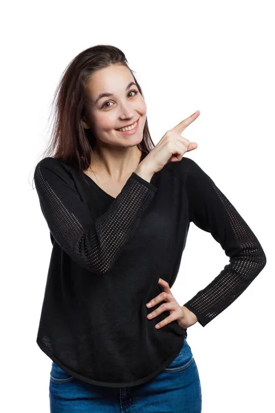 Sorridente giovane donna che punta su — Foto Stock