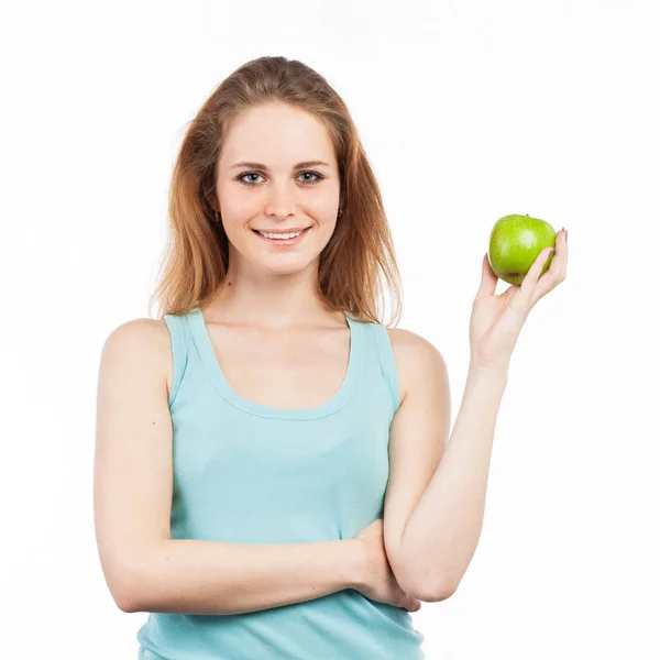 Donna che mostra una mela verde — Foto Stock