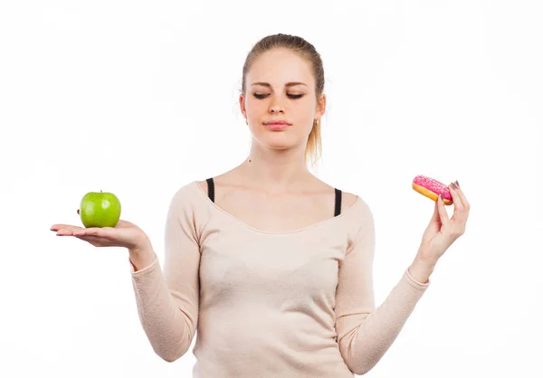 Mujer, manzana y donut — Foto de Stock