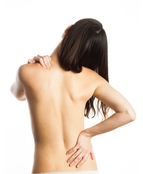 Donna massaggiare il suo dolore alla schiena — Foto Stock