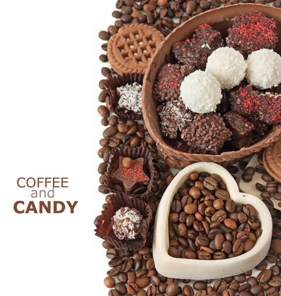 Chocolate sweets, candy and cakes with coffee beans — Stock Photo, Image