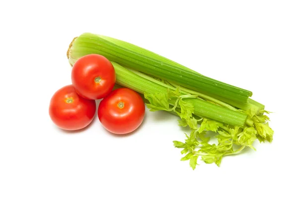 Celery and ripe tomatoes isolated on white background — Stockfoto