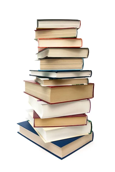 Stack of different books isolated on white background. vertical — Stock Photo, Image