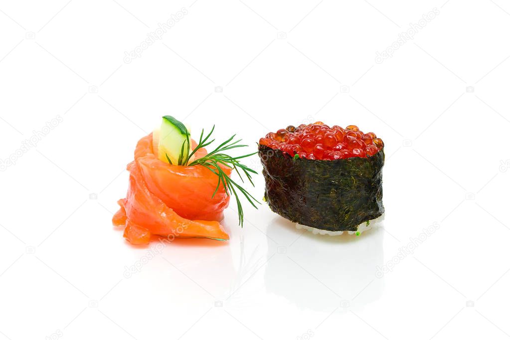 Gunkan with red caviar and roll with cucumber on a white backgro