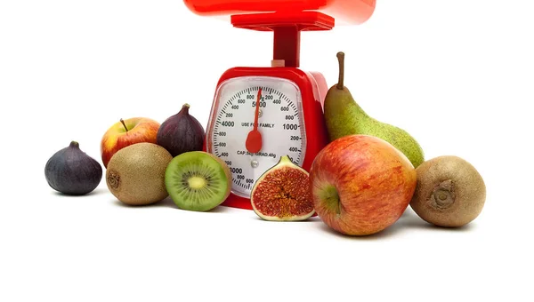 Ripe fruit and kitchen scales on a white background — Stock Photo, Image