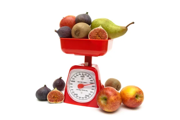 Fruit and kitchen scales isolated on white background — Stock Photo, Image