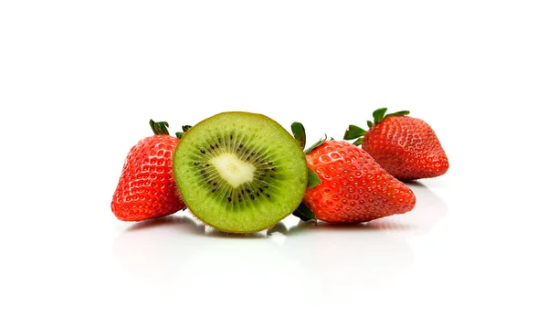 Kiwi and fresh strawberries on a white background — Stock Photo, Image