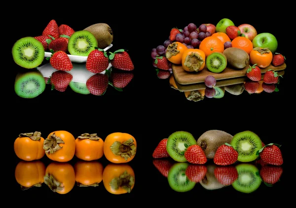 Maturare succosa frutta su uno sfondo nero . — Foto Stock
