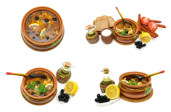 Prato de sopa hodgepodge russa em panela de cerâmica e outros alimentos — Fotografia de Stock