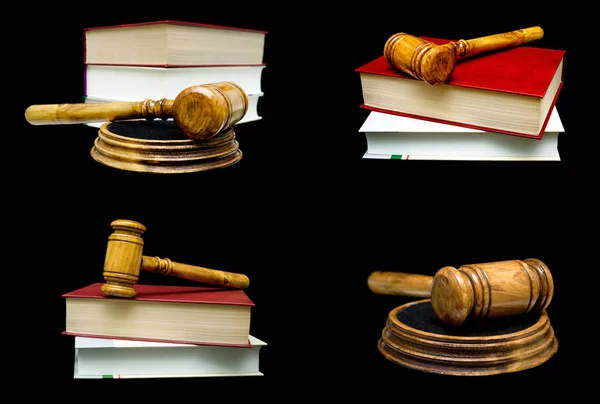 Wooden judge hammer and book on a black background. — Stock Photo, Image