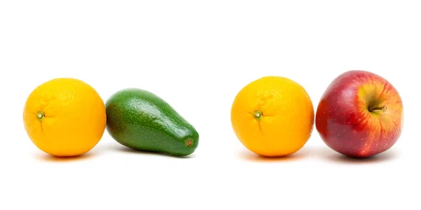 Naranja, manzana y aguacate sobre fondo blanco —  Fotos de Stock