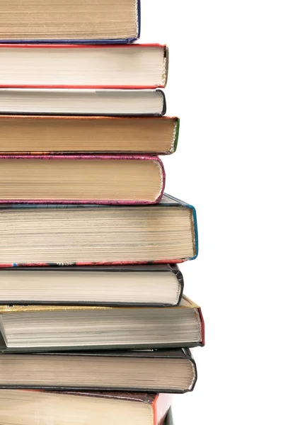 Stack of different books on a white background — Stock Photo, Image