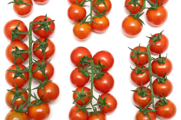 Tomates cereja em um fundo branco — Fotografia de Stock