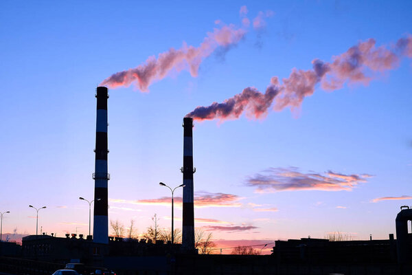 thick smoke belching from factory chimneys