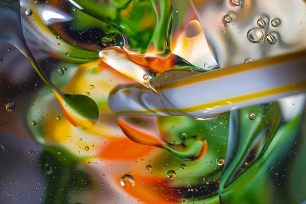 Kleurrijke achtergrond van waterdruppels — Stockfoto