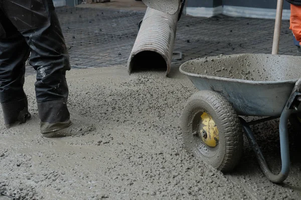 builders poured concrete at the construction site