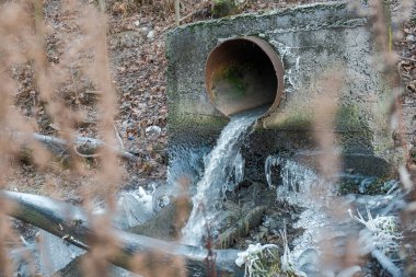 the dirty sewage from factories is dumped into the river