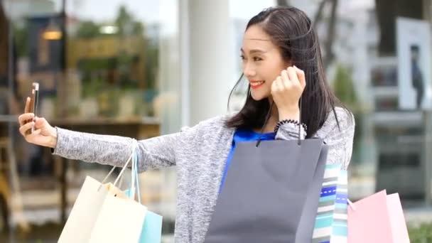 The girl happily took her picture. — Stock Footage The girl happily took her picture. Stock Video