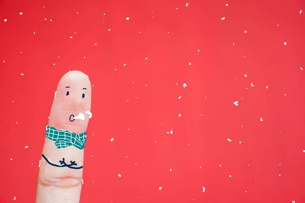 Creative idea finger.Winter scene of shivering man in snowstorm or ice storm — Stock Photo, Image