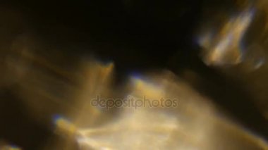 Film yakmak Footage.Light bakliyat ve yanıyor. Gerçek mercek parlaması ve hafif sızıntı ile koyu arka plan üzerinde Ultra yüksek çözünürlüklü güzel ışık sızıntısı.