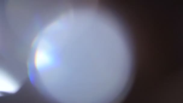 Fuite de lumière à portée de main. Film Burn Overlay Lifetime.Light impulsions et lueurs. belle fuite de lumière en Ultra Haute Définition sur fond sombre avec éruption de lentille réelle et fuite de lumière . 