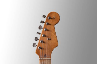 Vintage electric guitar head close up  clipart
