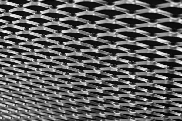 Expanded steel mesh close up in black and white