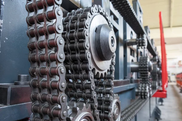 Triple strand roller chain on three sprockets — Stock Photo, Image