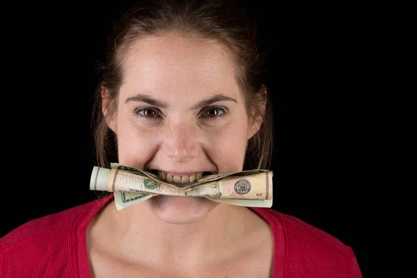 Женщина с американскими деньгами в зубах Стоковое Фото