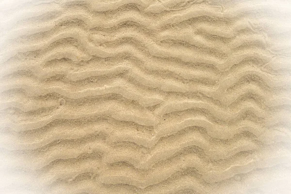 干潟の背景から波状の砂 バックアップのための素朴なテクスチャ画像 — ストック写真