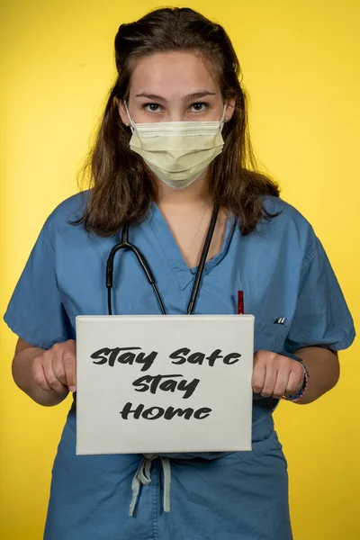 Stay Safe Stay Home Nurse Holding Small White Sign Wearing — Stock Photo, Image