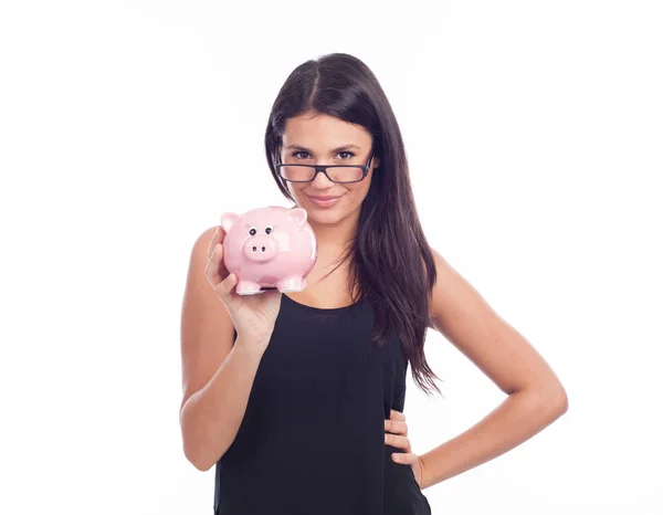Vrouw in glazen houden piggy bank — Stockfoto