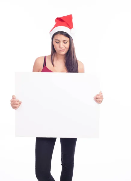 산타 모자 종이 들고 있는 여자 — 스톡 사진