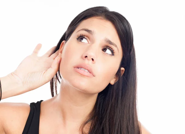 Curiosity woman touching her ear — Stock Photo, Image