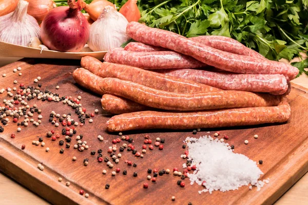 Close View Raw Sausages Chilli Herbs Wooden Board Spices — Stock Photo, Image