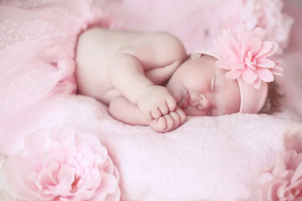 Portrait of adorable sleeping baby girl over pink, infant child. — Stock Photo, Image