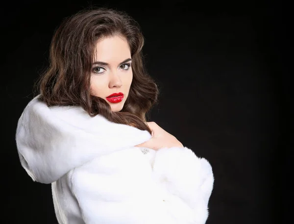 Fashion beauty woman in white fur coat isolated on black studio — Stock Photo, Image