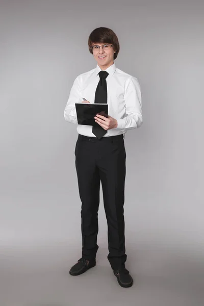 Business man holding notebook. Confident handsome student smilin — Stock Photo, Image