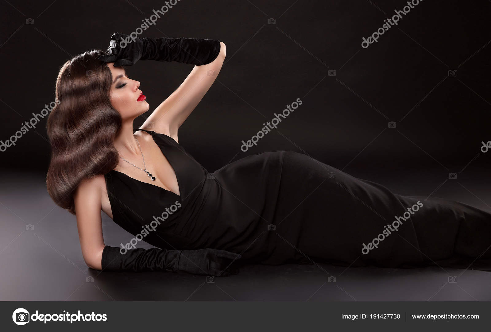 Elegant Lady In Long Sexy Dress With Retro Wavy Hairstyle