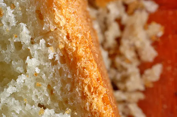 Close-up macro of bread and bread crumbs — Stock Photo, Image