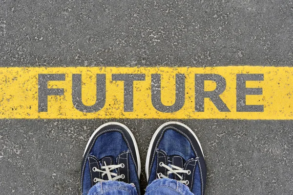 Top View of Male sneakers on the asphalt road with yellow line a — Stock Photo, Image