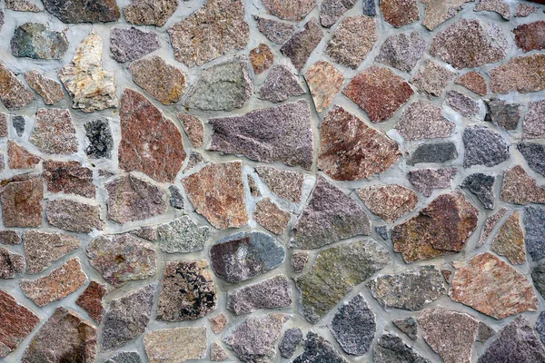 조약돌 배경 텍스처 오래 된 벽돌 또는 돌 벽 만든. — 스톡 사진