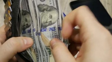Cüzdan, içinde para olan çanta, şans veya başarısızlık sonrası para saymak, nakit kredi almak.